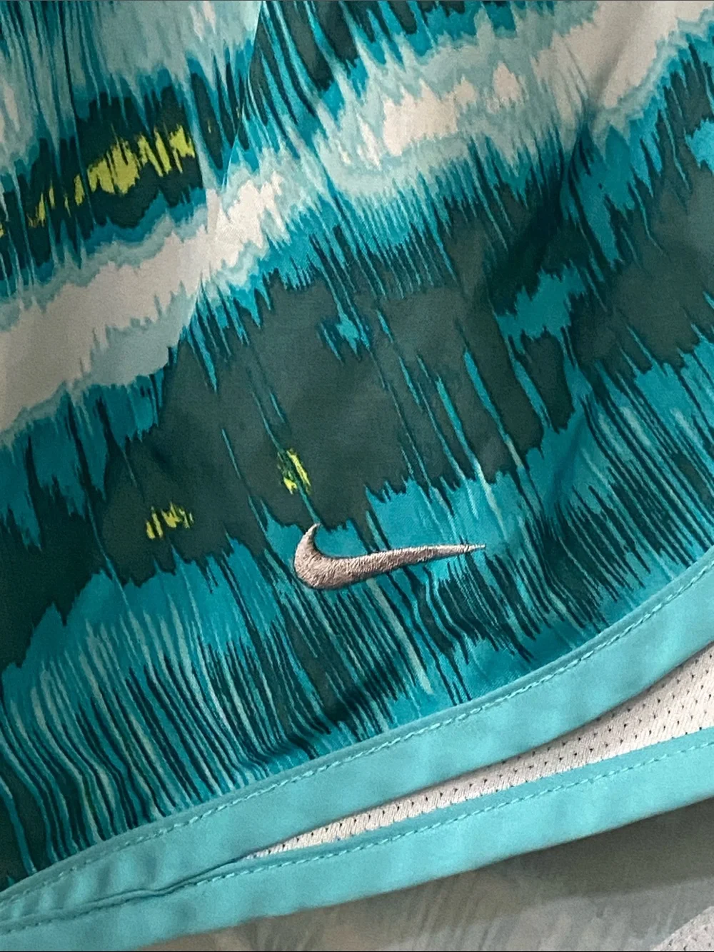 Nike Teal, White and Yellow Patterned Women’s Athletic Shorts. Size M